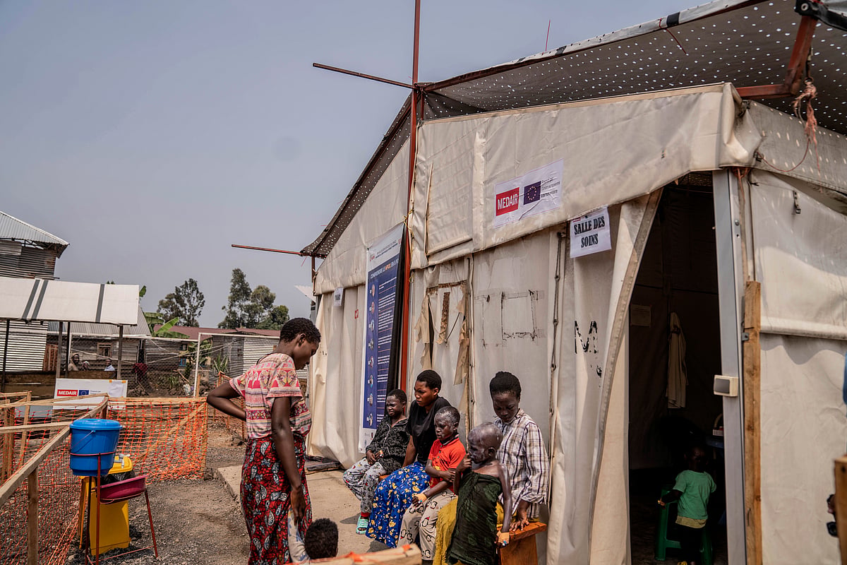 AP  : Children suffering from mpox wait for a treatment at a clinic in Munigi, eastern Congo, Monday, Aug. 19, 2024
